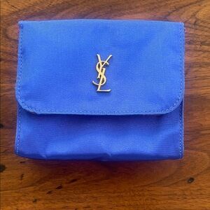 YSL Blue Pouch with Gold Logo Red interior 4 1/2 x 4 x 1inch deep Excellent cond